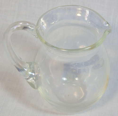 Vintage handmade glass milk jug