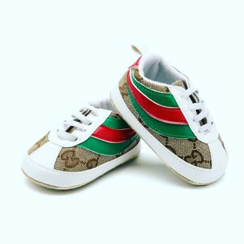 gold gucci baby shoes