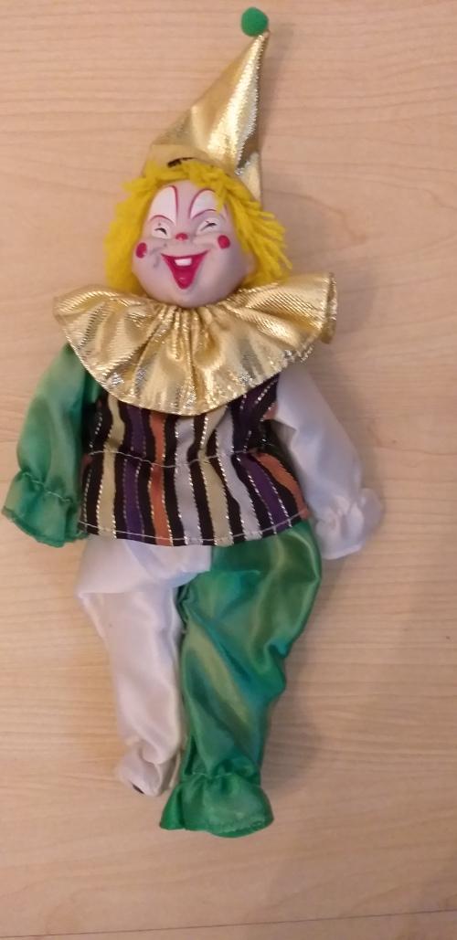 small porcelain clown dolls